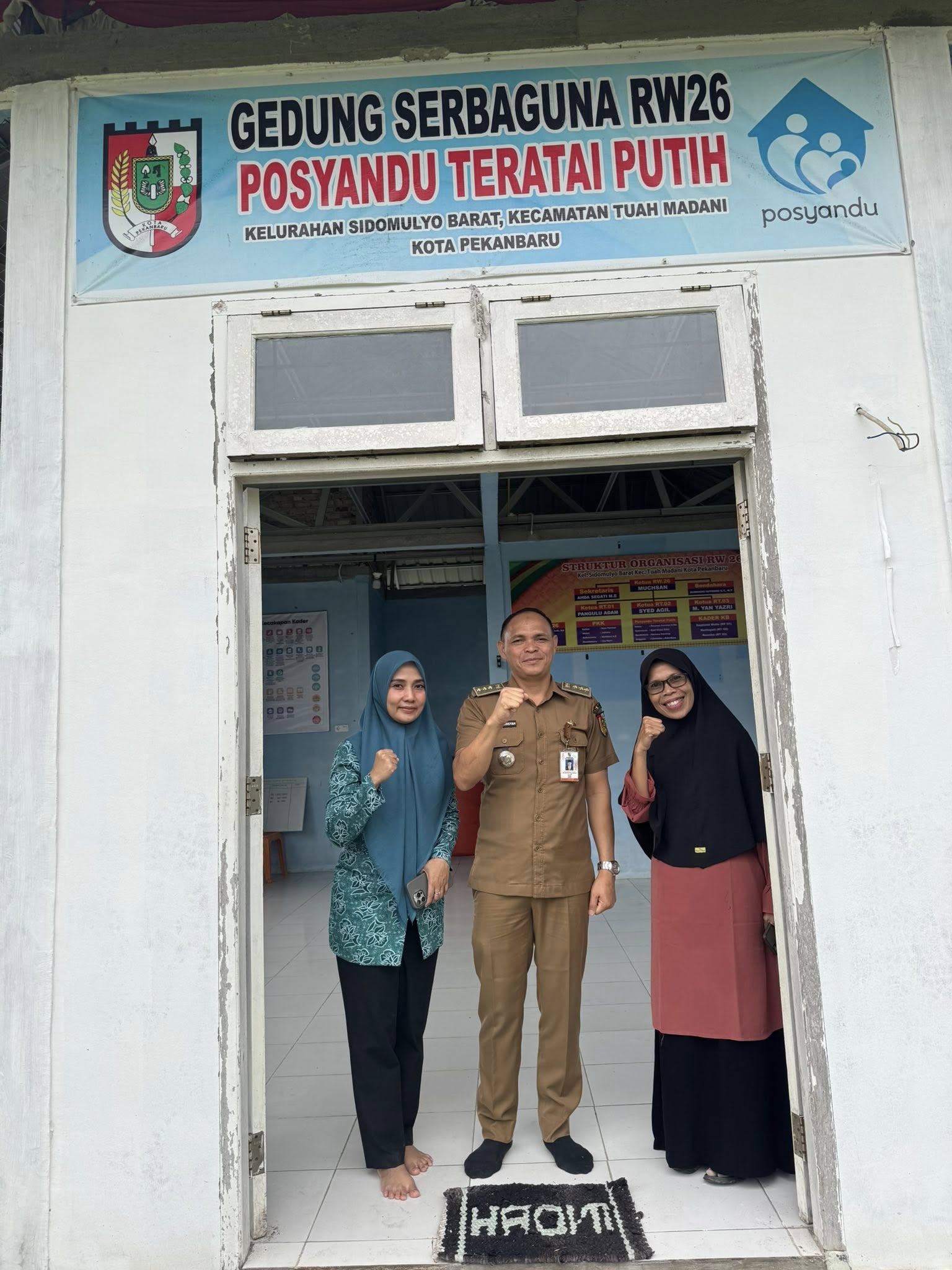 Ketua PKK Tuah Madani kunjungi posyandu teratai putih RW 26 Kelurahan Sidomulyo Barat Kecamatan Tuah Madani